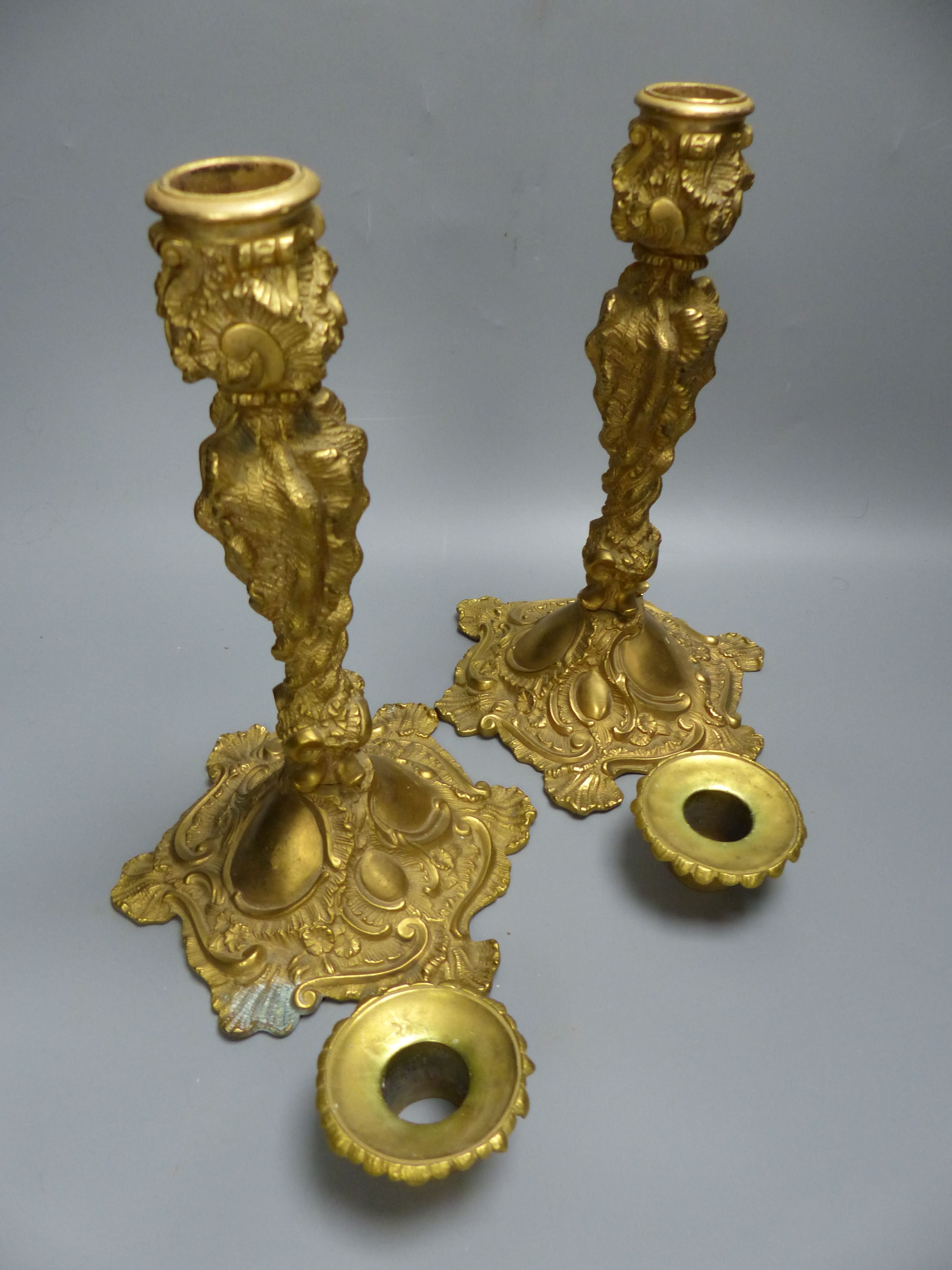 A pair of Louis XV style ormolu candlesticks, height 26.5cm